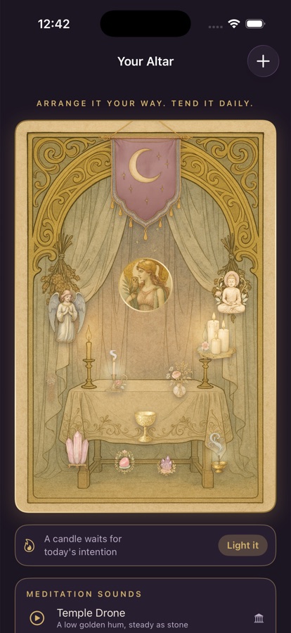 A personal altar arranged with a goddess figure, candles, crystals and flowers